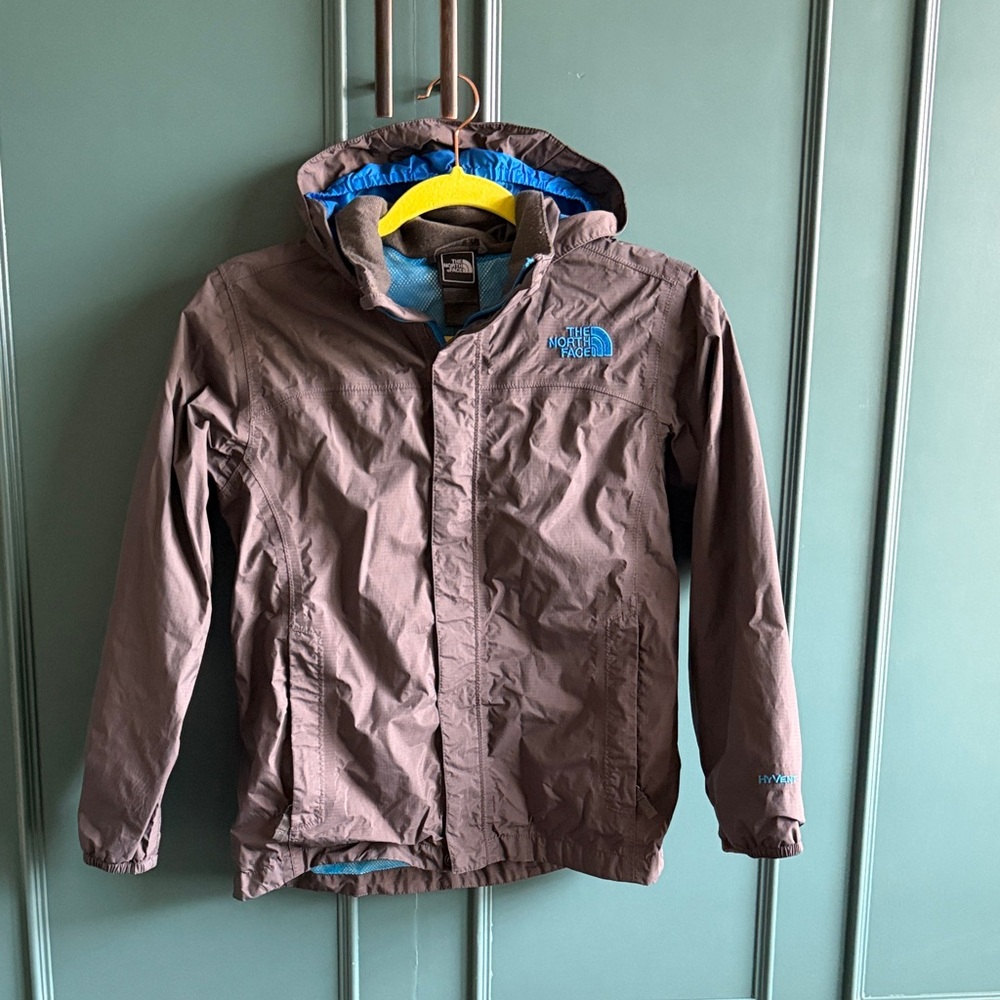 The North Face grey hooded rain jacket with blue accents, boys size 12, raincoat